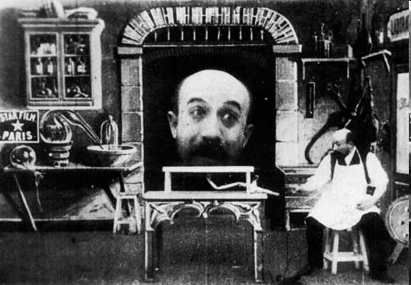 Frame of a Melies film. The viewer's perspective is the one of a theatrical representation.