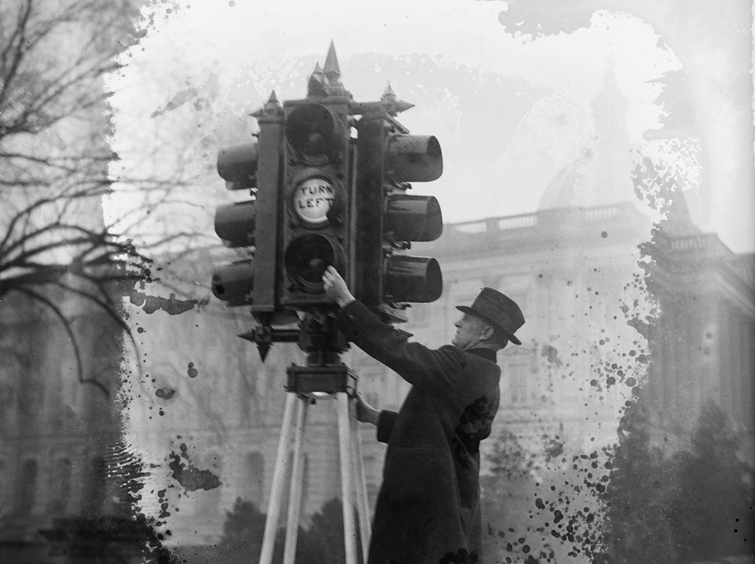 Traffic Director Eldridge inspecting new lights, 1926