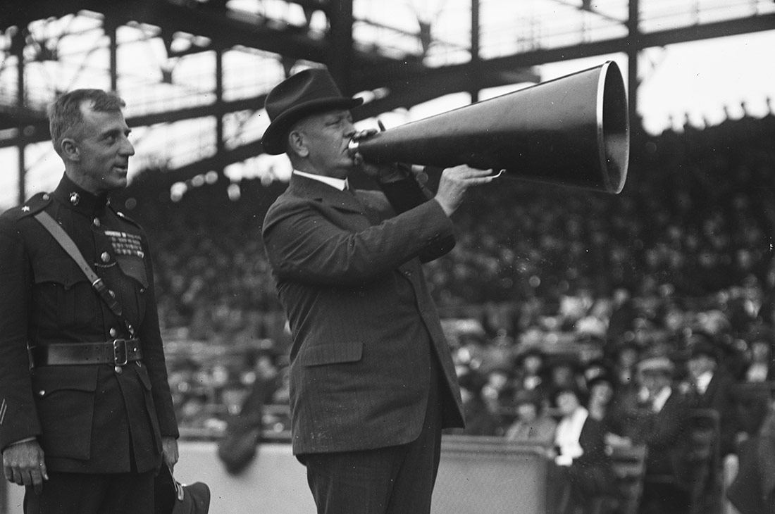 Edwin Denby with megaphone at ball field, 1922