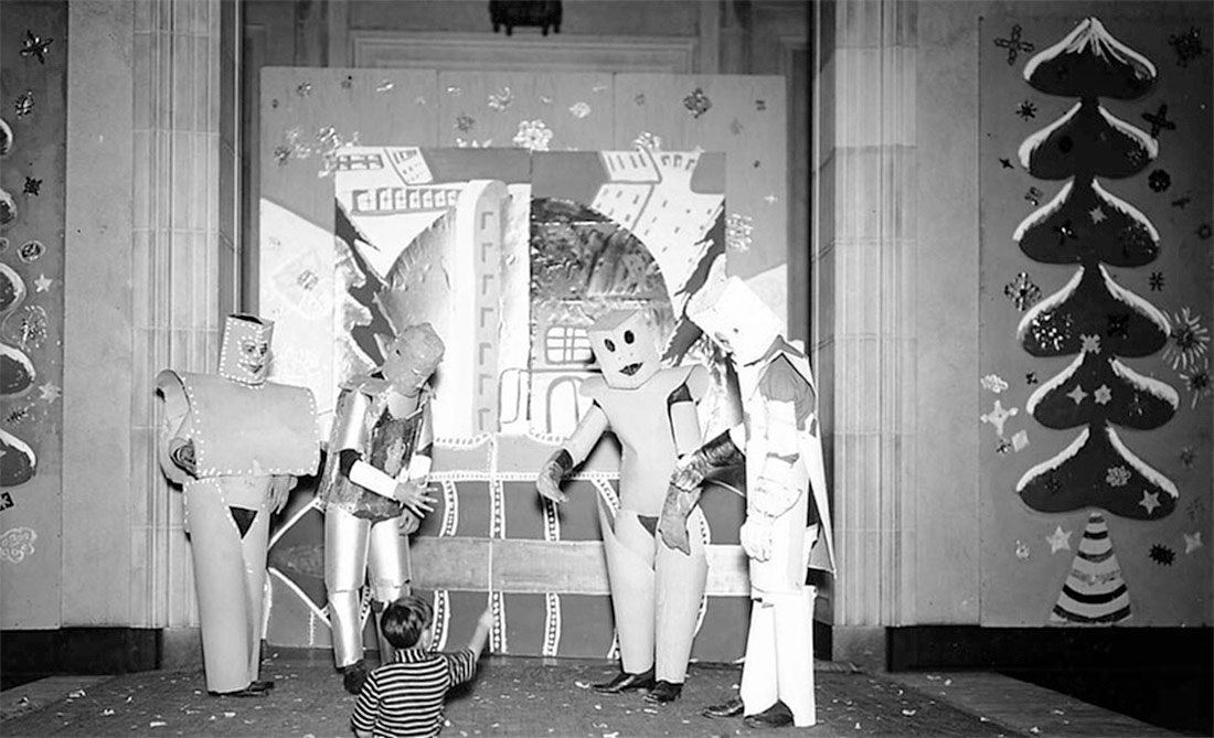 Play with characters dressed as robots. Toronto, 1936