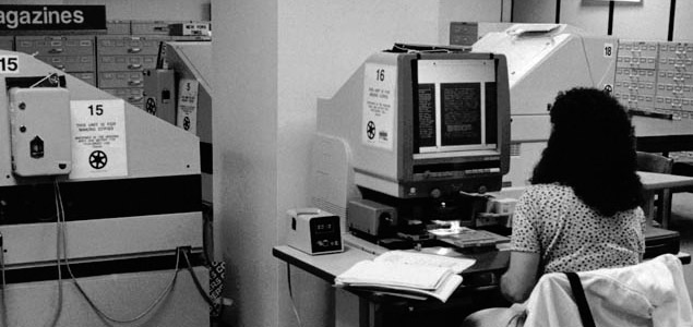 Woman at microfilm reader/printer, Ohio University's Alden Library, 1994. 