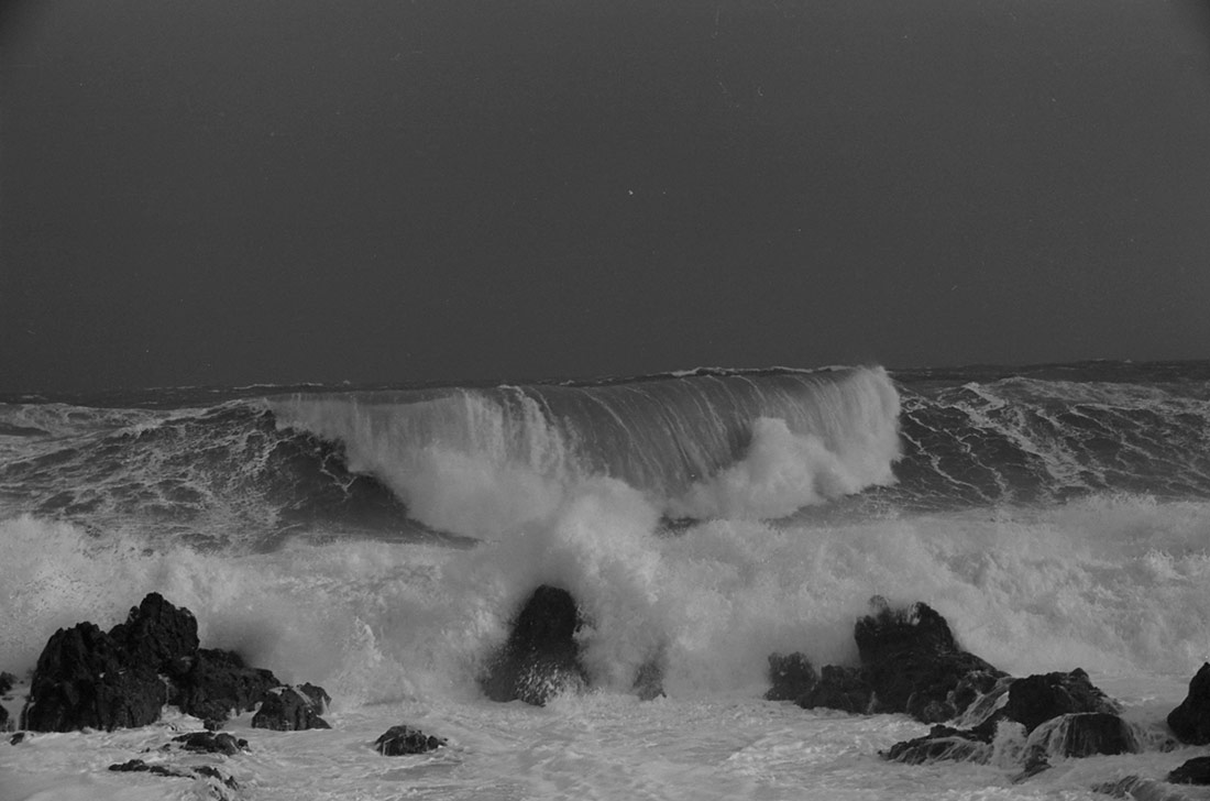 Waves breaking over rocks. Wellington, 1940