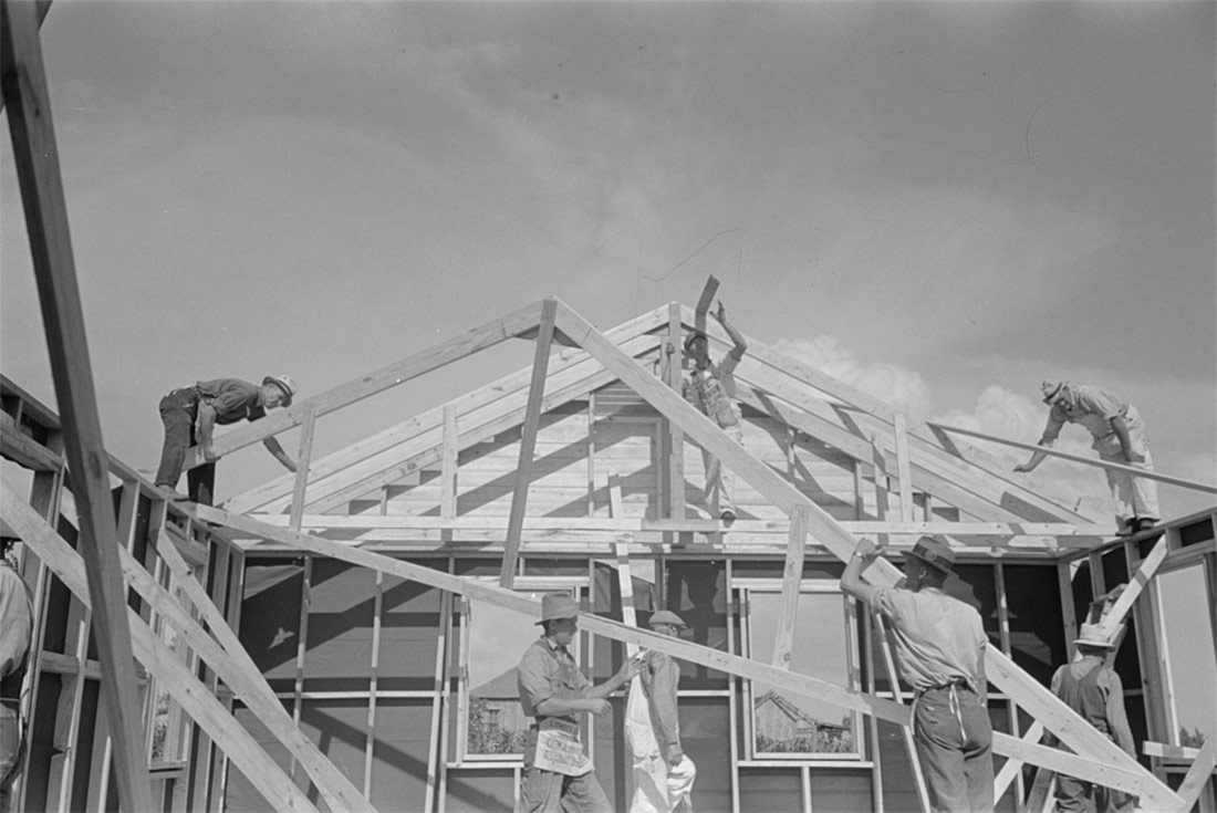Putting trusses of house in place. Missouri 1938