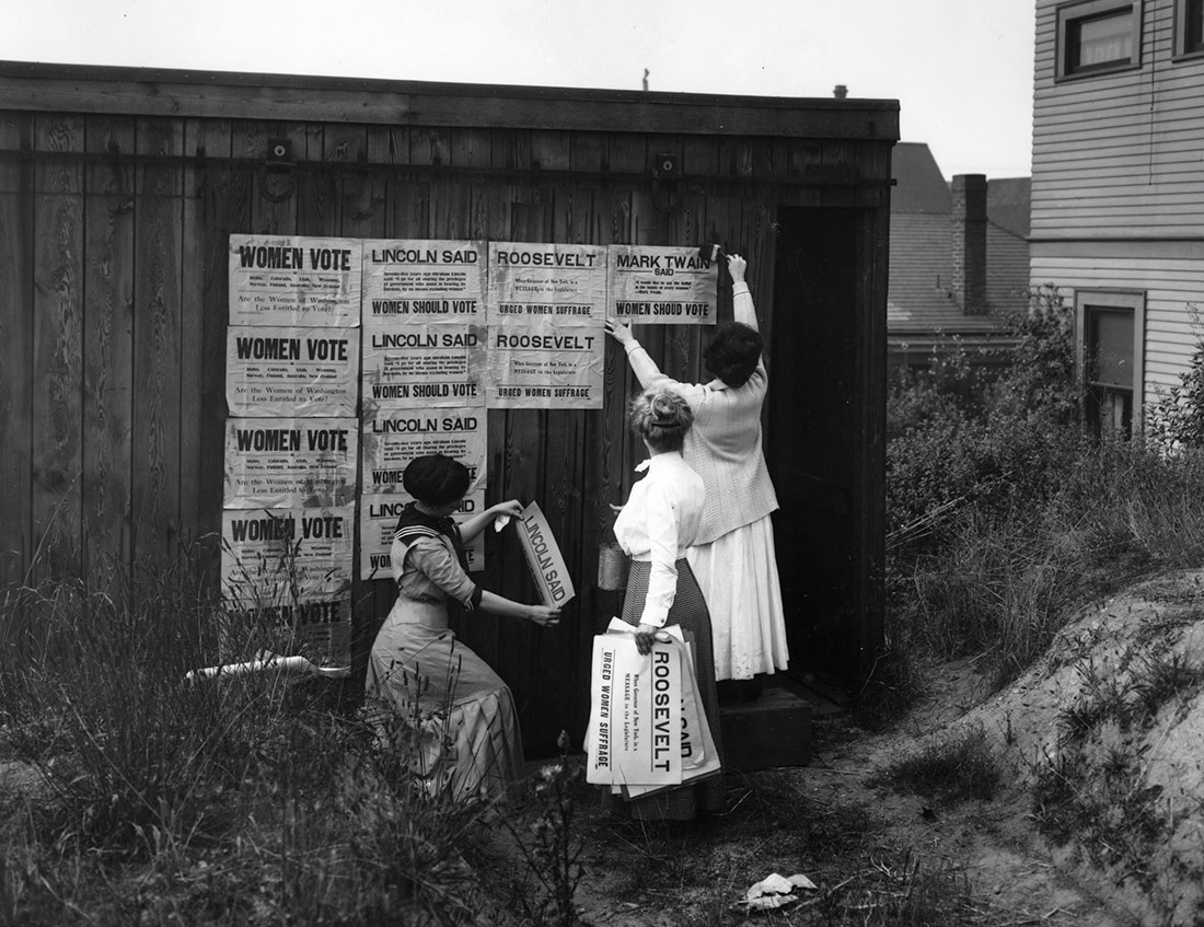  Washington Equal Suffrage Association put up posters. Seattle, 1910