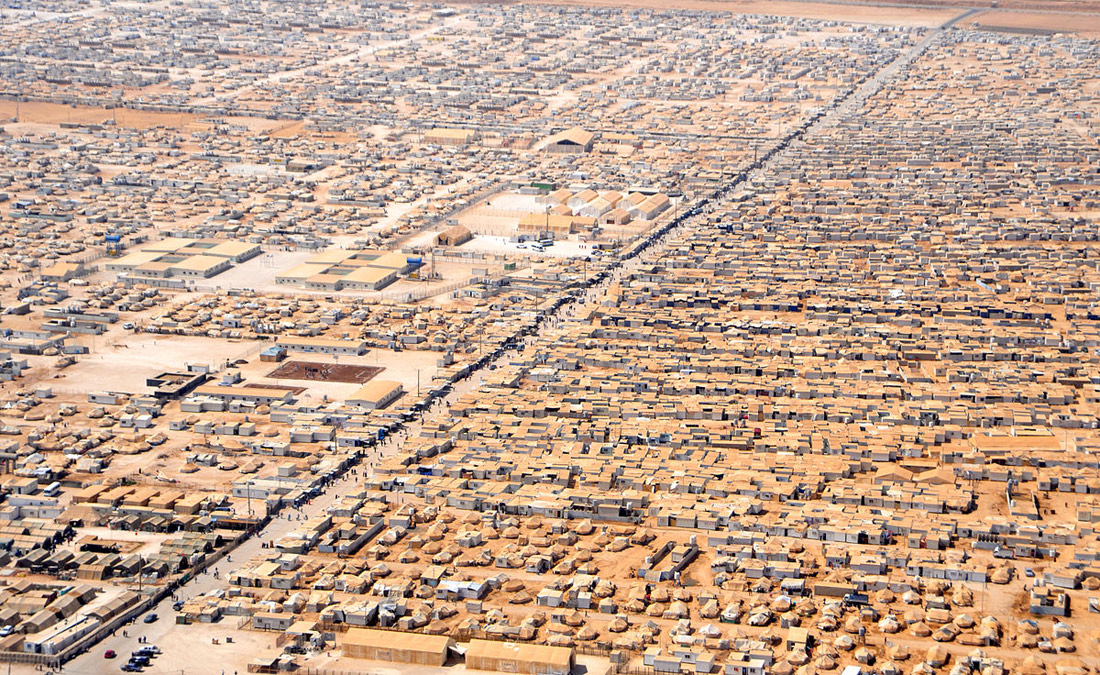 Zaatari refugee camp for Syrian refugees in Jordan which only contains a population of 80,000 out of the 1.3 million in the country, 18 July 2013